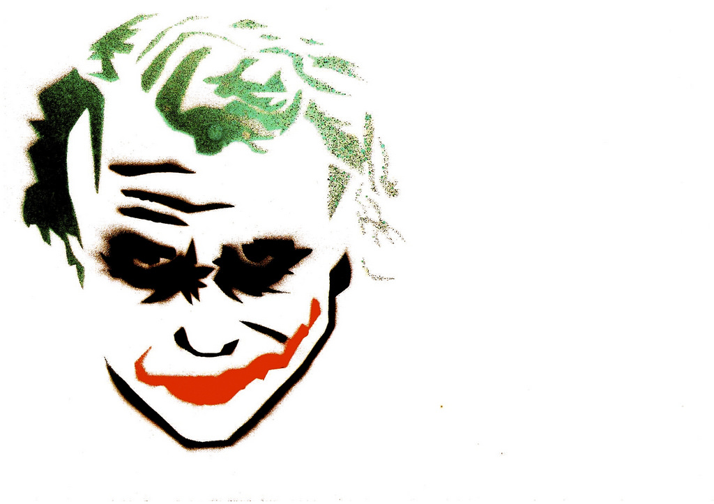 Stylized Joker face with green hair, black eye makeup, and red smile in spray-paint aesthetic.