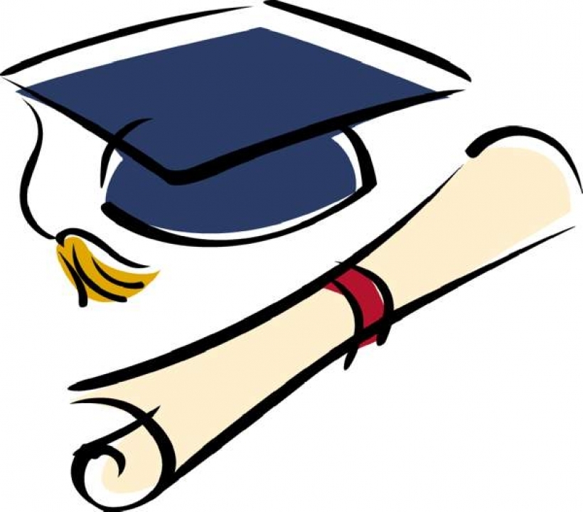 Graduation cap with yellow tassel and rolled diploma tied with red ribbon.