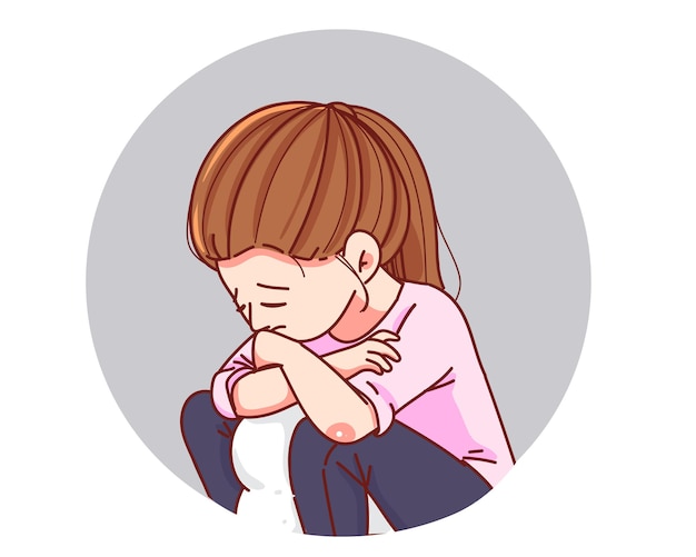 Sad young woman hugging her knees, head bowed in emotional distress or loneliness.