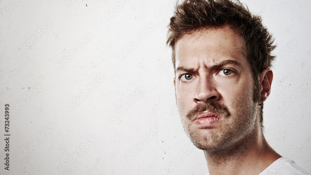 Portrait of an angry man with mustache Stock-Foto | Adobe Stock