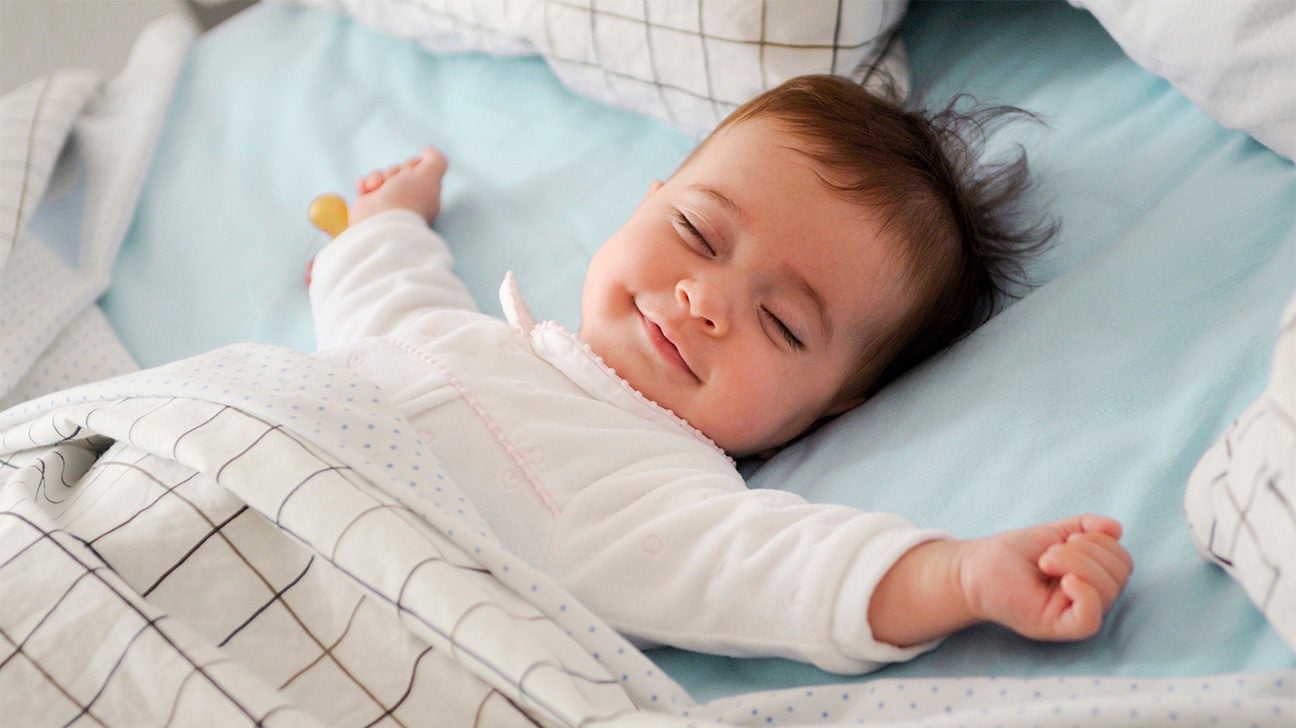 When Is It Safe for My Baby to Sleep with a Blanket?