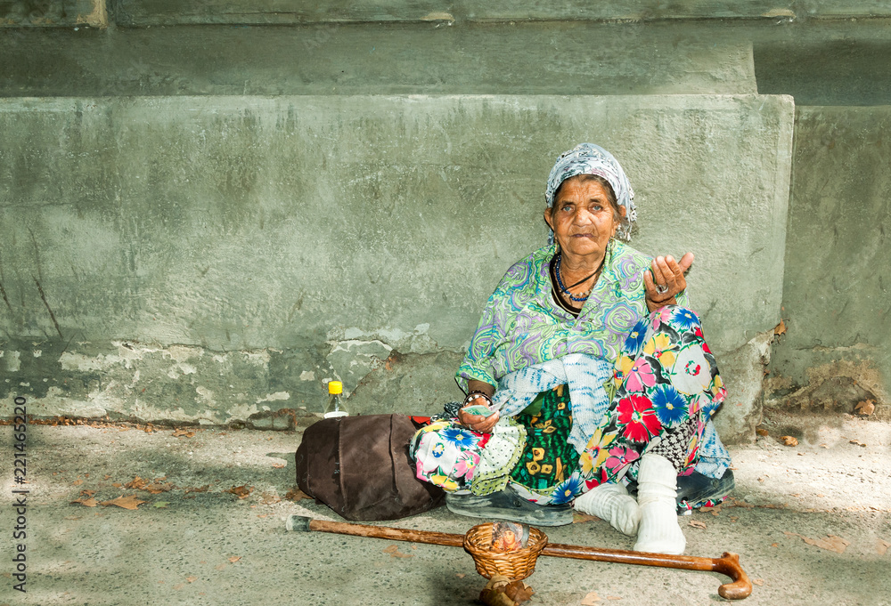 Homeless woman, Old homeless Gypsy beggar woman with wrinkled face ...