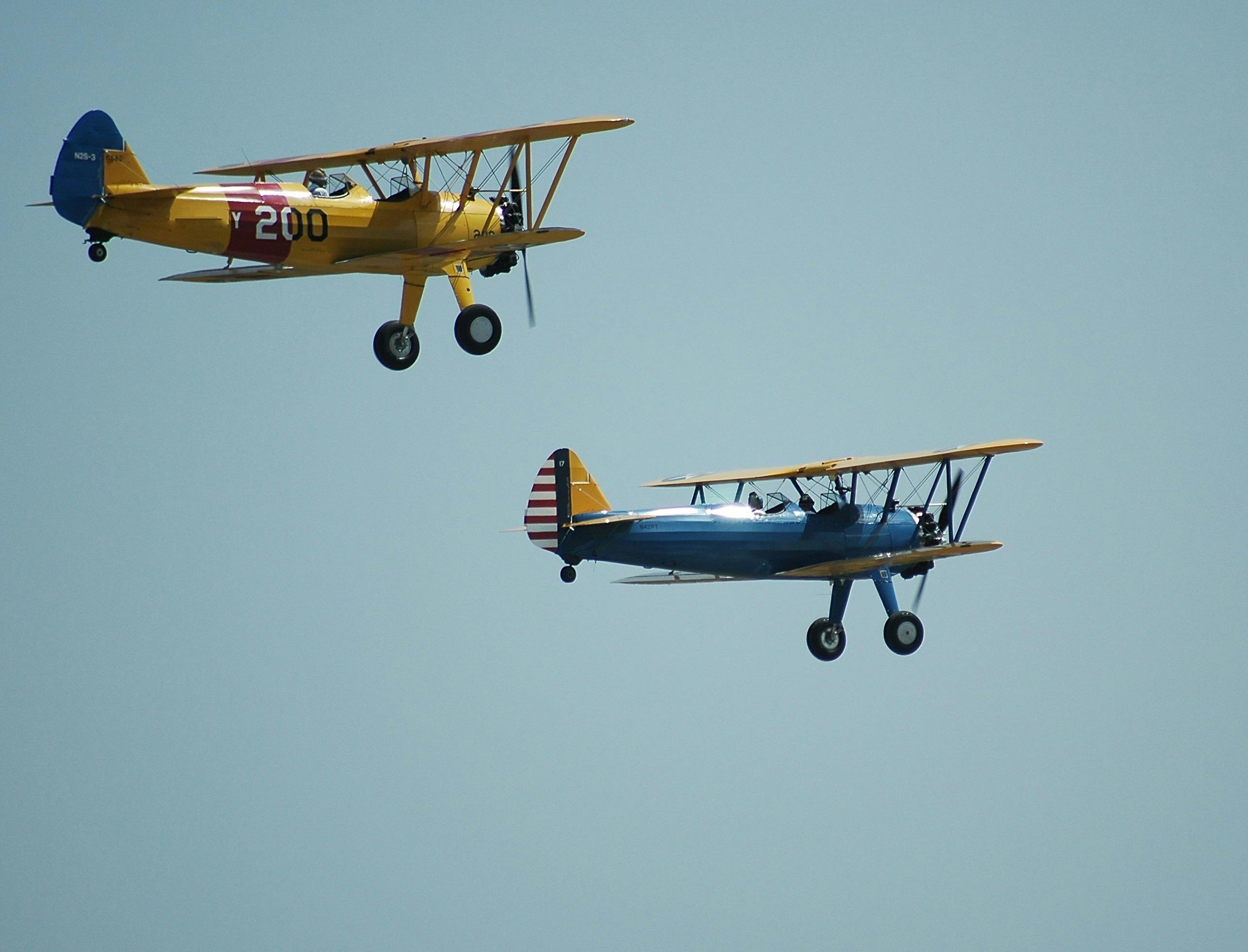 2 Biplanes Flying · Free Stock Photo