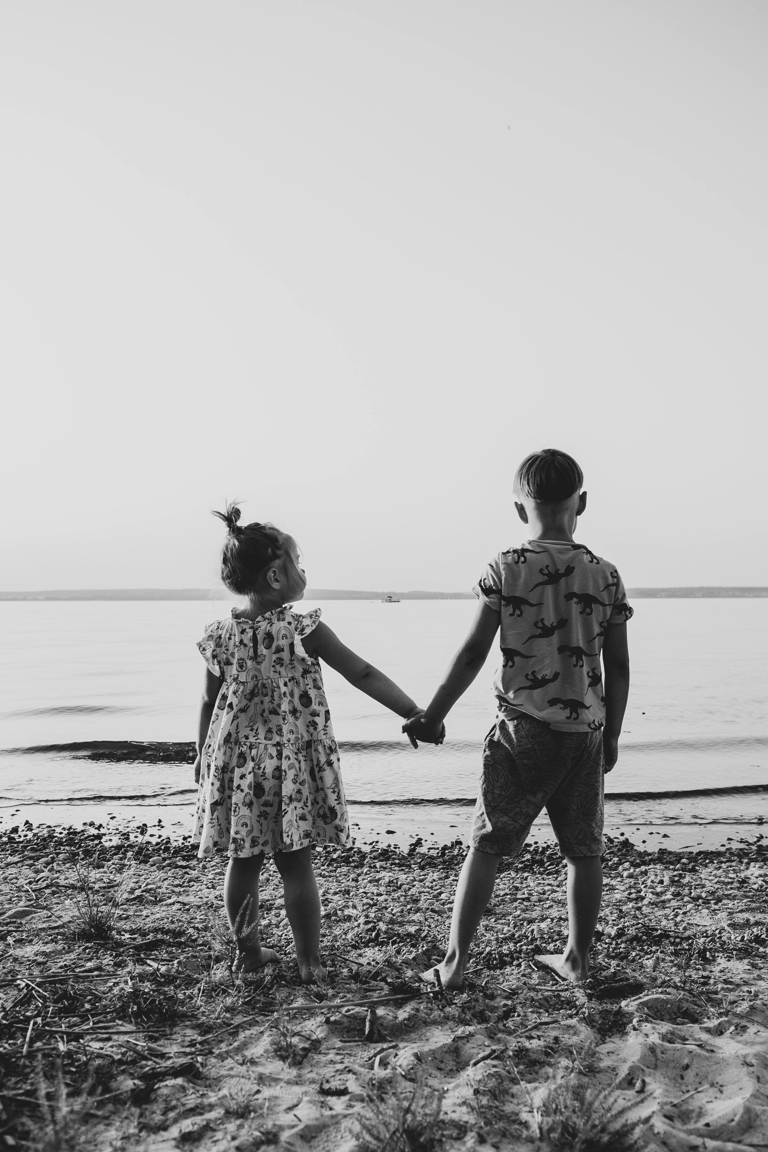 black and white kids holding hands