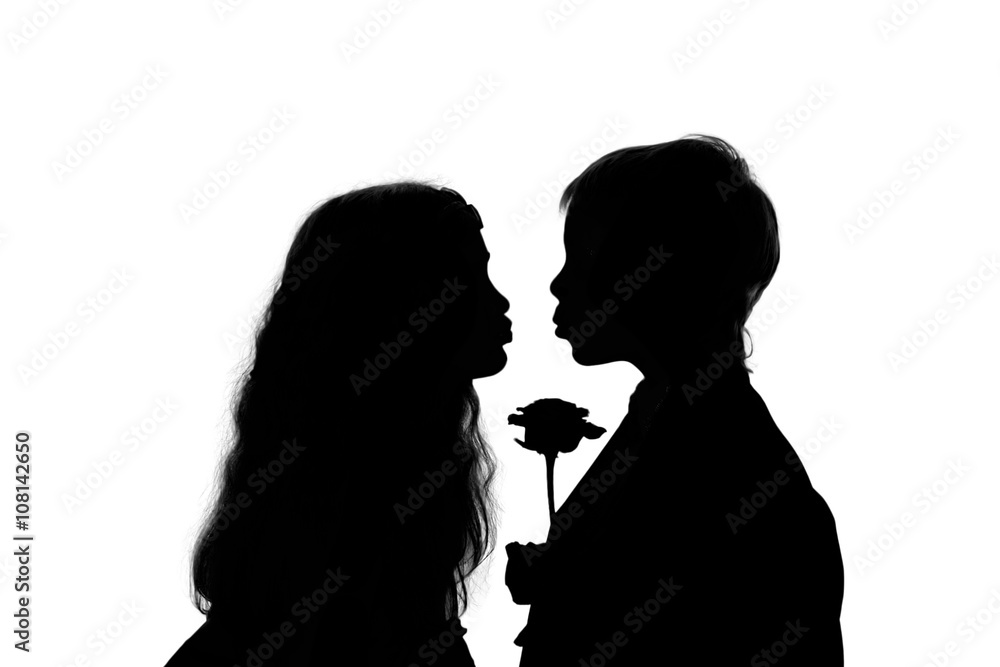 boy and girl kissing silhouette