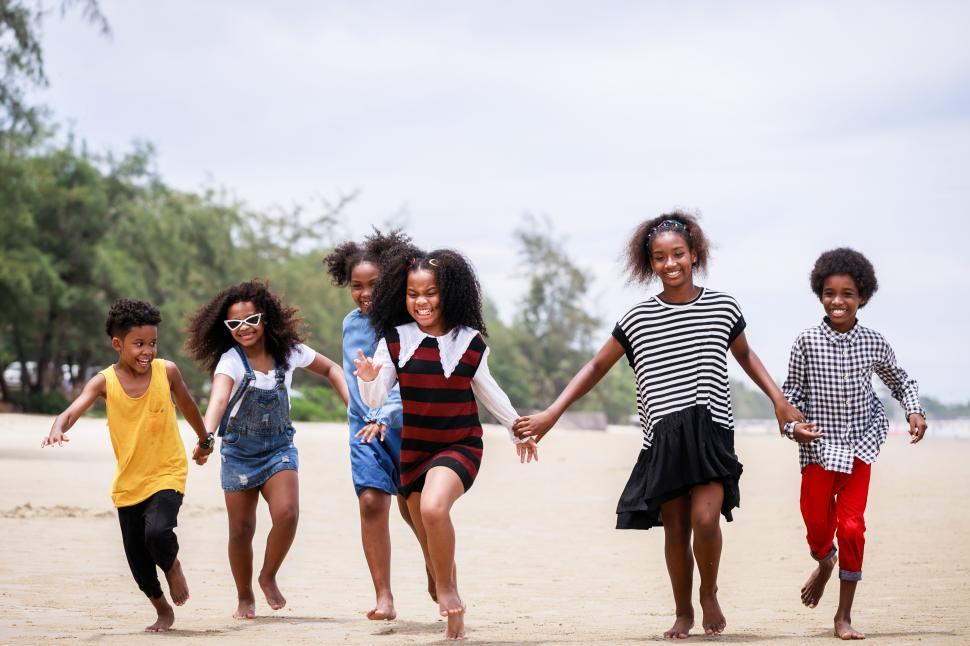 Free Stock Photo of Children run together holding hands at the ...