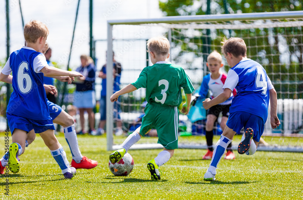 children playing football