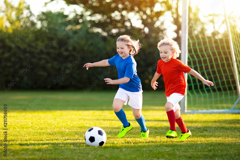 children playing football