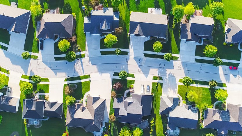 What Is a Gated Community? Pros and Cons of Buying a Home Inside