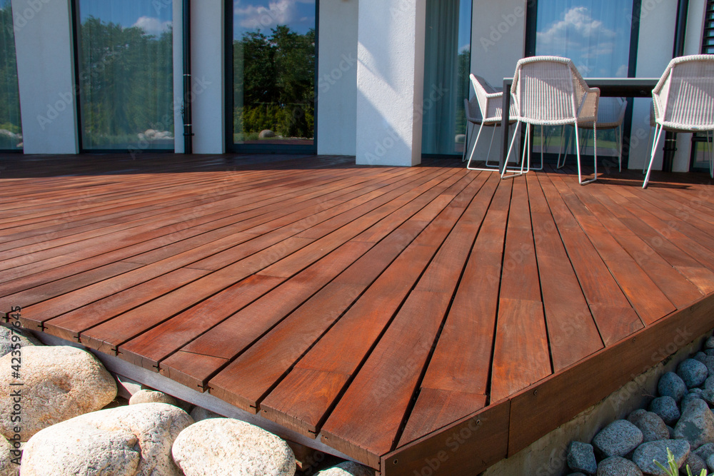 Ipe wood deck, modern house design with wooden patio, low angle ...