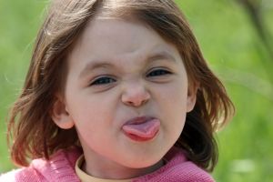 face sticking tongue out