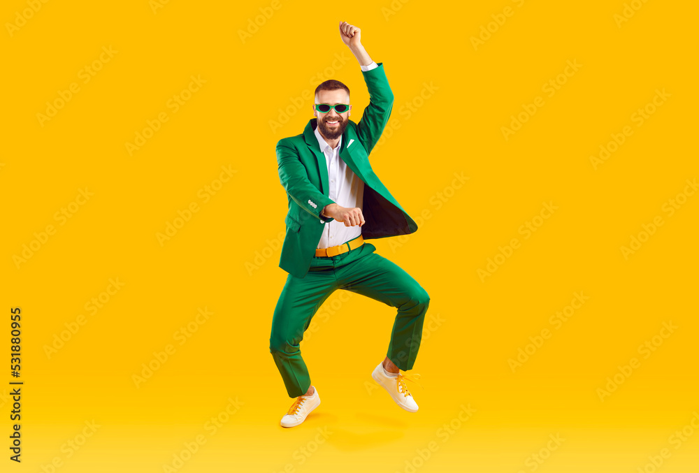 Cheerful energetic man has fun dancing in gangnam style at St ...