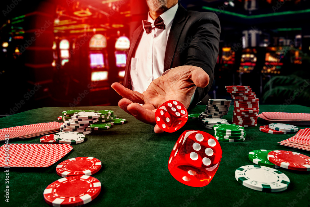 Stock-Foto „Gambling concept. Close up of male hand throwing dice ...