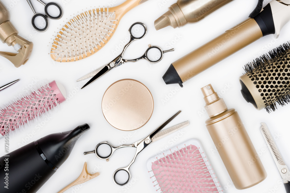 Poster, Wandbilder Hairdressing tools and various hairbrushes on white  background top view, 40x26.7 cm