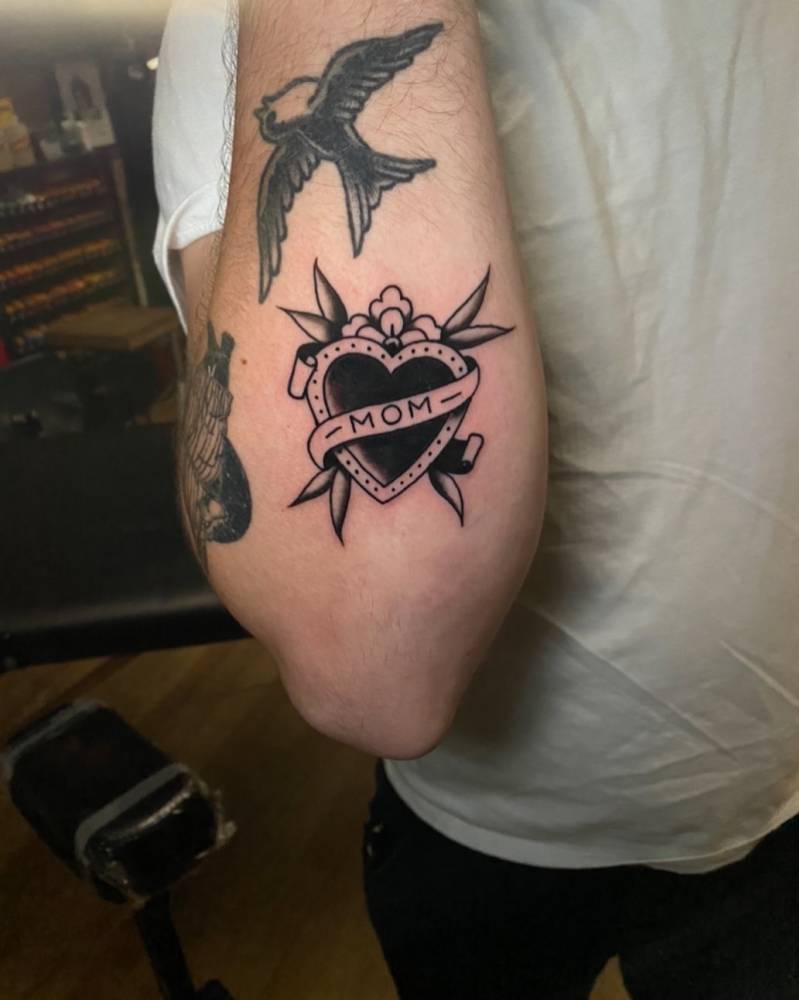 heart and banner tattoos