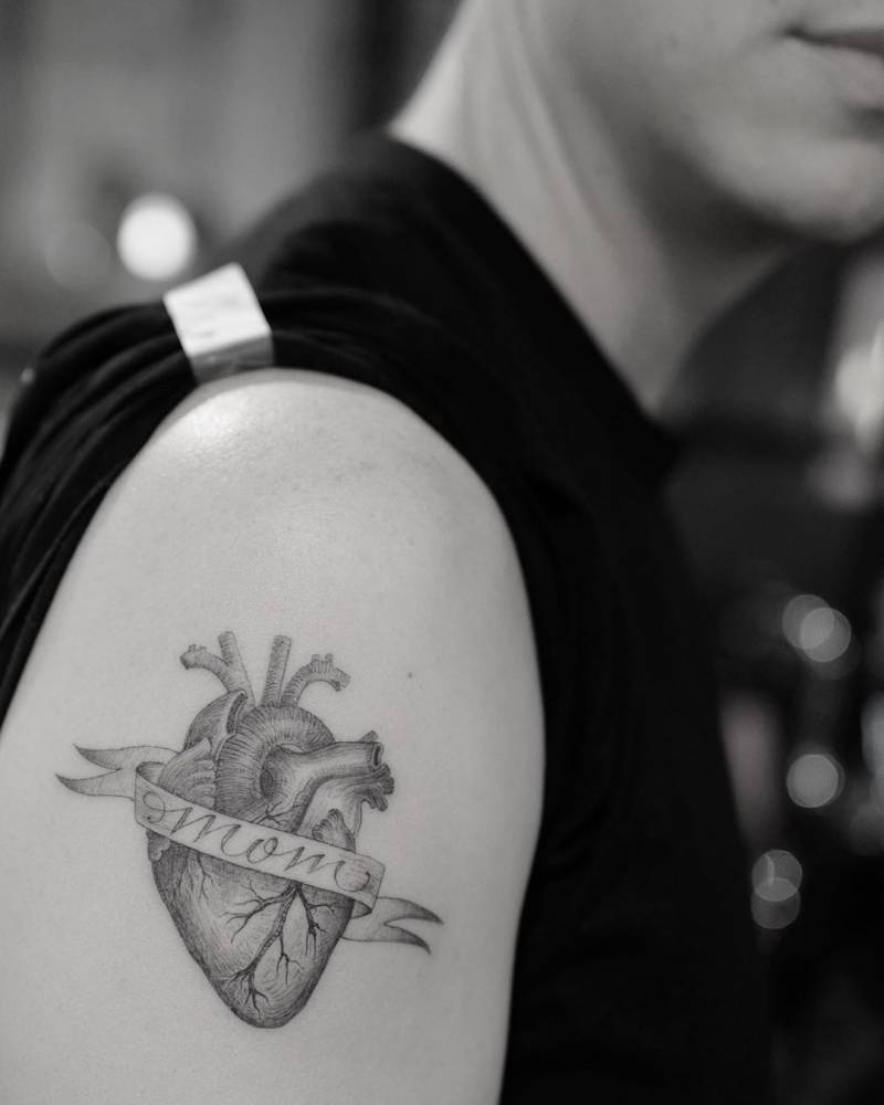 heart tattoo with banner