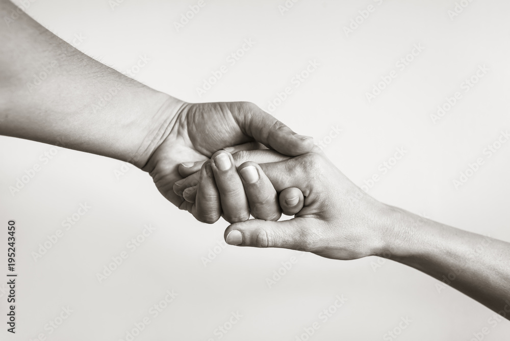 Poster, Wandbilder Lending a helping hand. Solidarity, compassion, and  charity., 40x26.7 cm