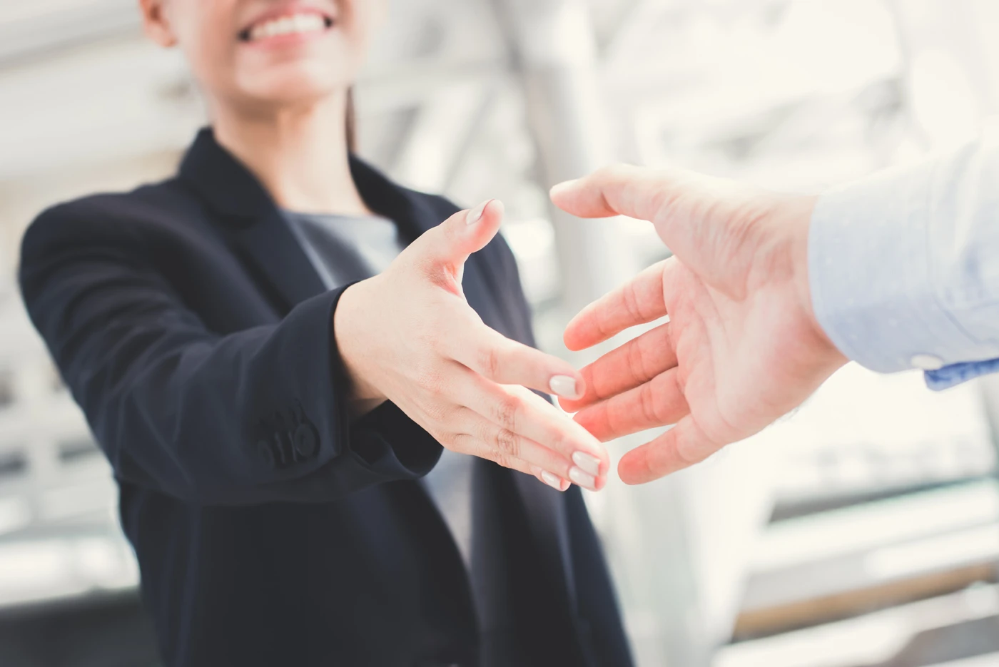 image of shaking hands