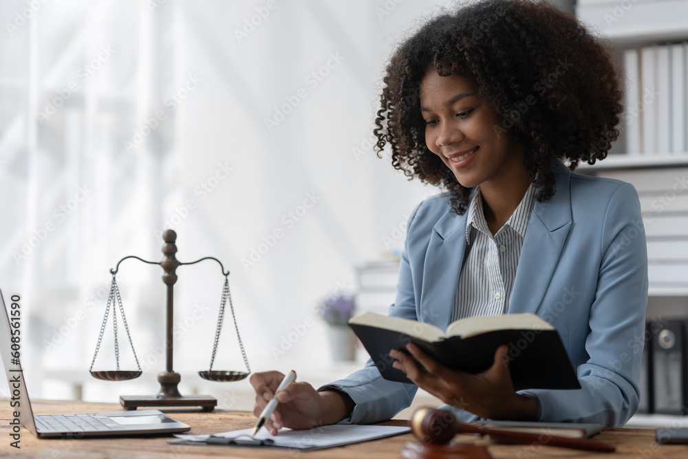 Poster, Wandbilder American woman lawyer or businesswoman African working  with laptop, searching, analyzing data, reading contract documents work  with ...
