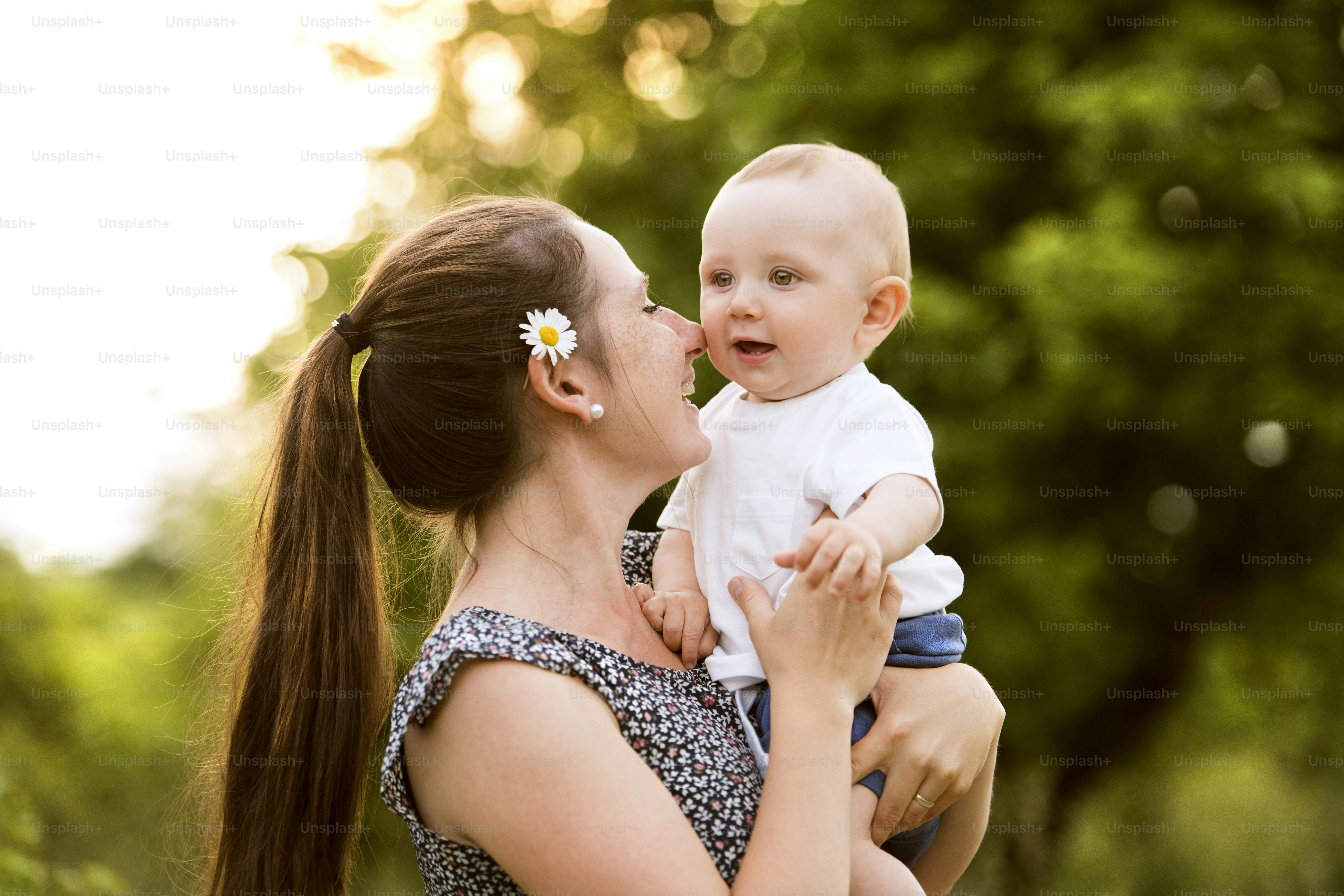 mom holding baby
