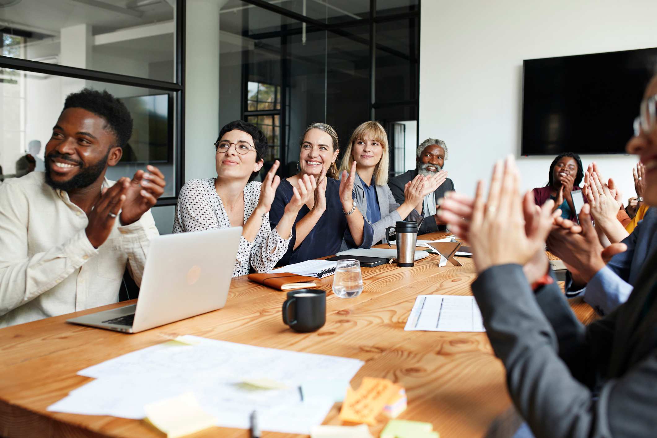 pictures of employees working together
