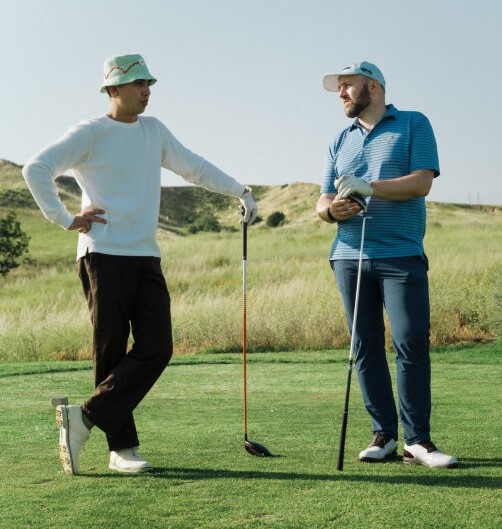 pictures of people golfing