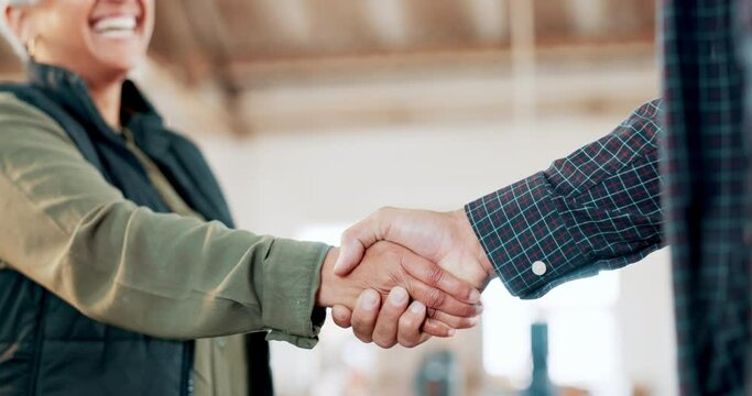 Engineering, teamwork or carpenter shaking hands in workshop for a  manufacturing deal. Woodwork collaboration, construction or closeup of  happy industrial workers in warehouse in a building agreement
