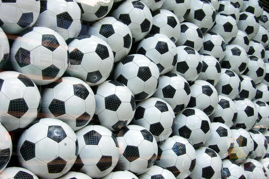 Many soccer balls by Matthias Hauser