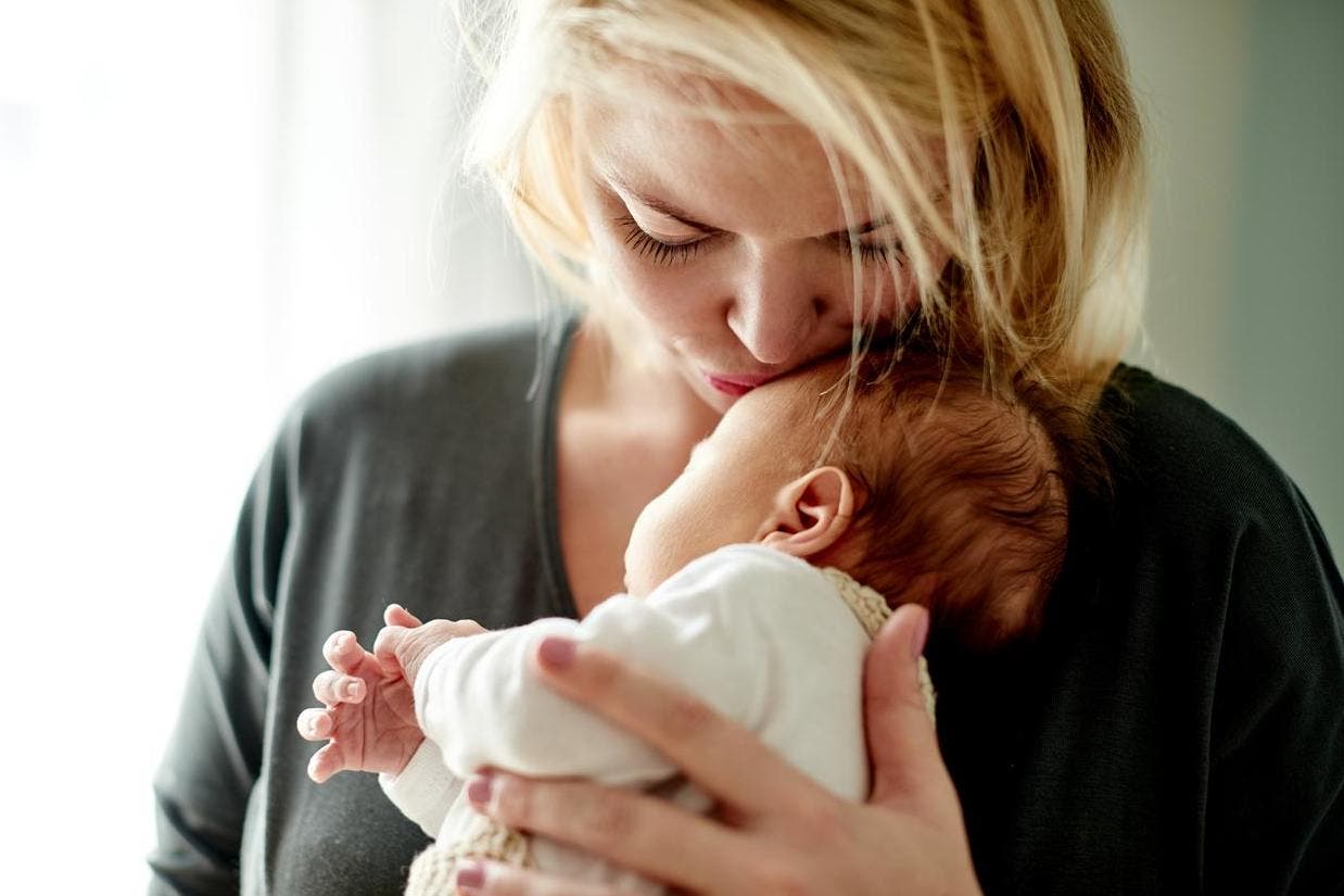 woman mothers
