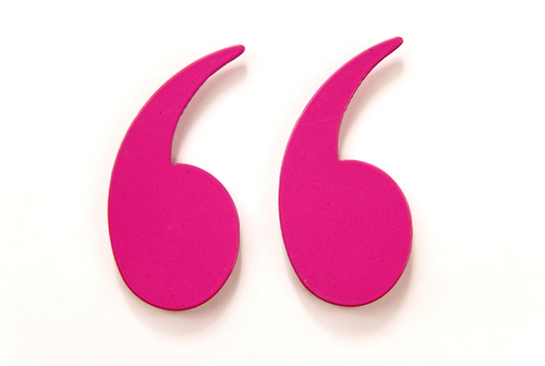 Vibrant pink quotation mark symbols on a clean white background, stylized and three-dimensional.