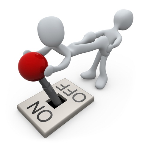 Two 3D figures struggle over a red toggle switch labeled ON and OFF, symbolizing conflict or decision-making.