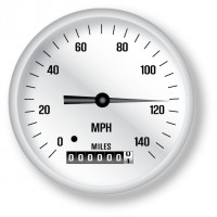 White analog speedometer showing 0 MPH with digital odometer reading 000000.1 miles