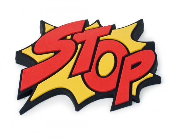 Bold red "STOP" text in comic-style explosion graphic with yellow and black outlines.