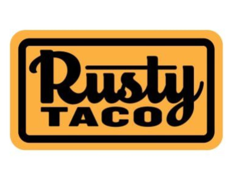 Rusty Taco logo featuring bold black script and block text on a yellow rectangular background with black border.