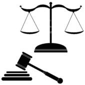 Black silhouette of justice scales above a judge’s gavel on sound blocks, symbolizing law and fairness.
