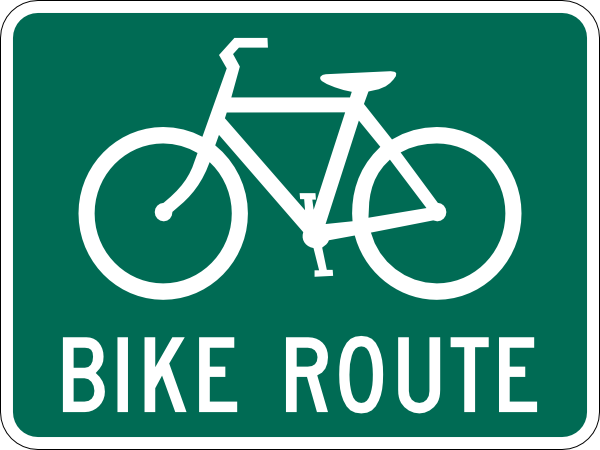 Green rectangular sign with white bicycle icon and text "BIKE ROUTE" indicating a designated cycling path.