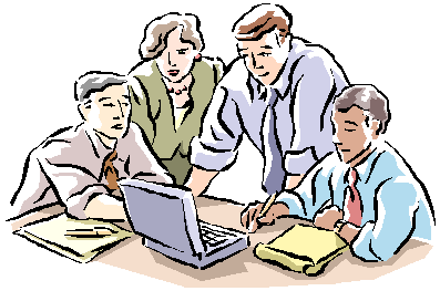 Four professionals collaborating around a laptop in a business meeting.