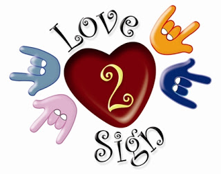 A red heart with a golden number 2, surrounded by colorful hand signs forming "I love you" in ASL, with "Love Sign" text above and below.