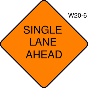 Orange diamond-shaped road sign warning "SINGLE LANE AHEAD" in black uppercase letters.