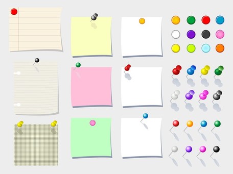 Colorful sticky notes and pushpins arranged on a light gray background, including lined, grid, and plain paper types.