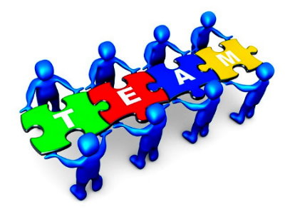 Blue 3D figures holding colorful puzzle pieces拼成 the word "TEAM" on white background.