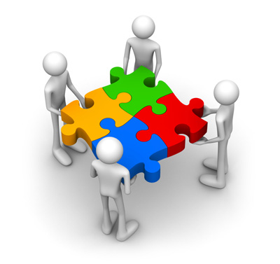 Four stylized figures collaboratively assembling a colorful four-piece puzzle on a white background.