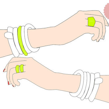 Two illustrated hands wearing white bangles and lime-green rings, showcasing bold, colorful jewelry styling.