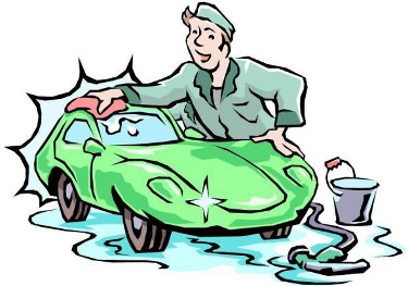 A smiling man in a green uniform washes a shiny green sports car with a sponge and bucket of soapy water.