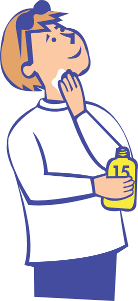 Man applying sunscreen to his face while holding a yellow SPF 15 bottle.