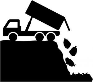 Black silhouette of a dump truck unloading material down a slope.