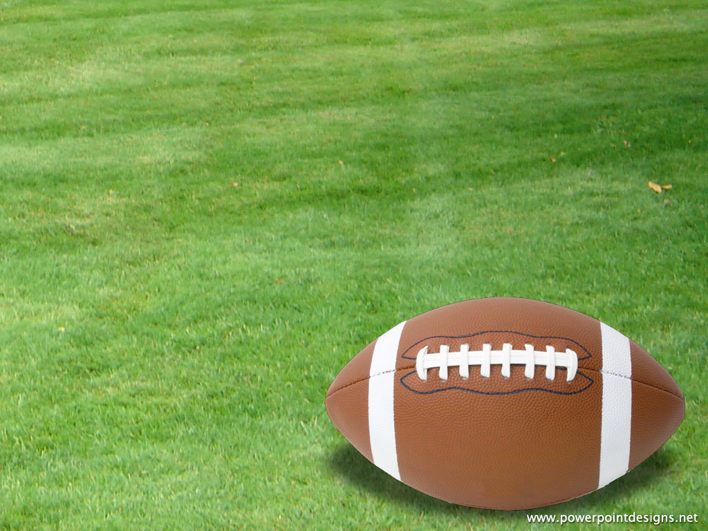 American Football on Grass Field - Sports Equipment & Game Setup