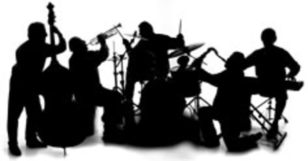 Silhouette of a live jazz band performing with upright bass, trumpet, drums, saxophone, and piano.