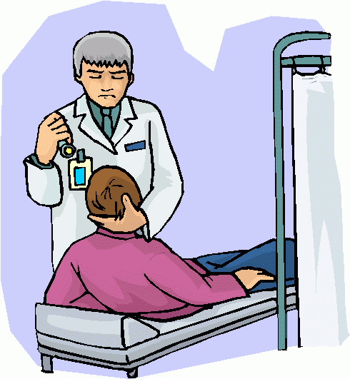 Doctor examining a patient lying on an exam table while holding a medical device.