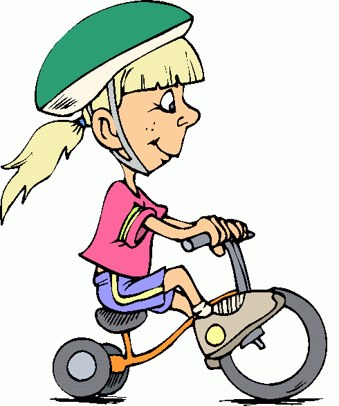 Smiling blonde girl wearing green helmet rides orange tricycle with training wheels.